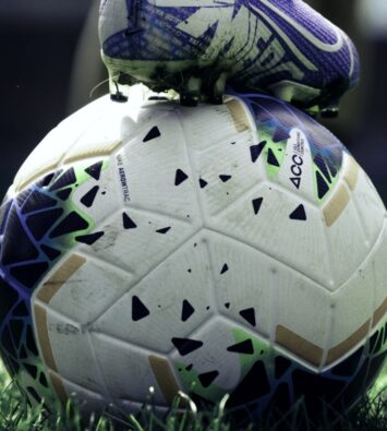 Soccer ball and cleat